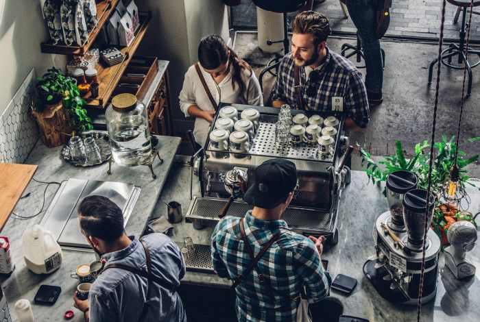 Four people in a coffee shop