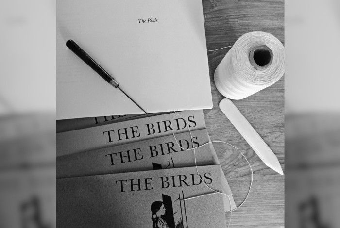 Black and white photo of bookbinding supplies.