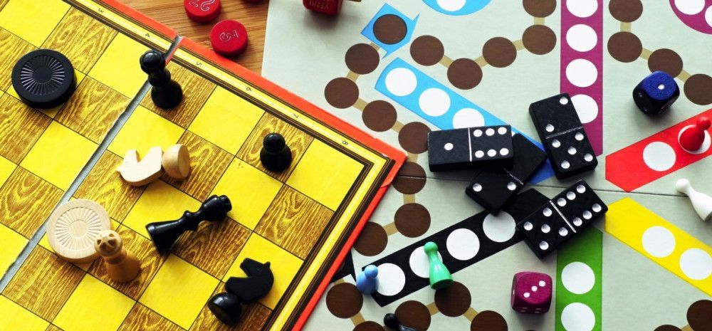 Board games and a variety of game pieces.