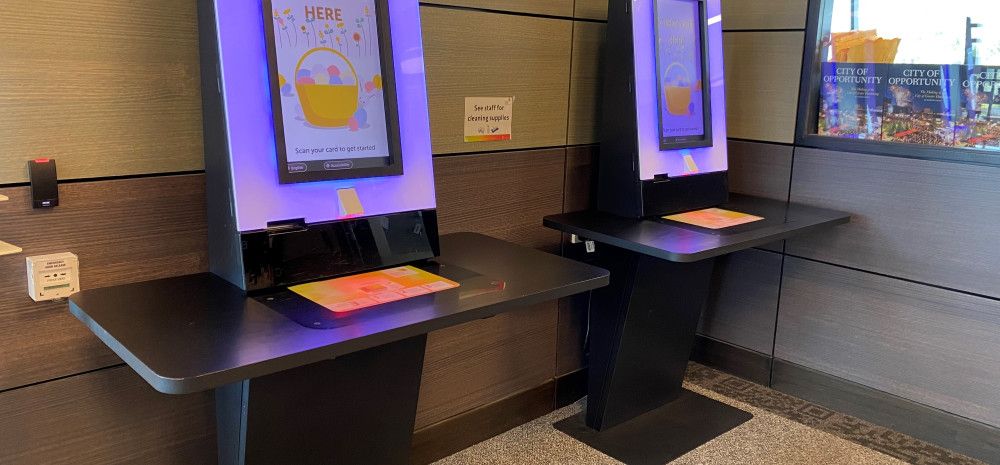 Two self-service loan kiosks.