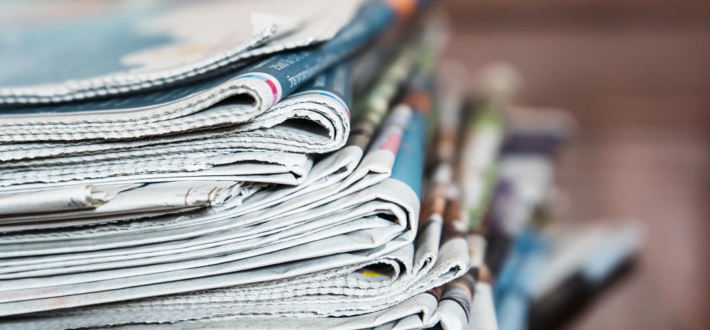 Stack of newspapers.