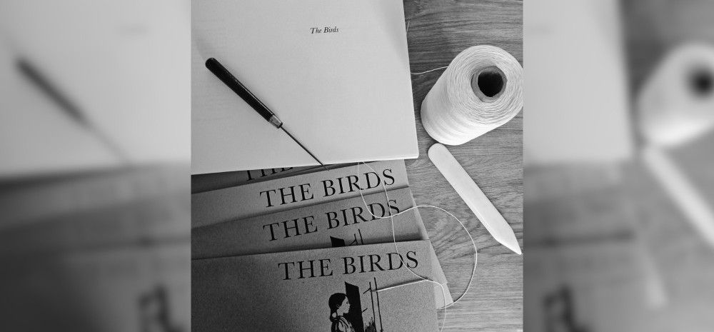 Black and white photo of bookbinding supplies.