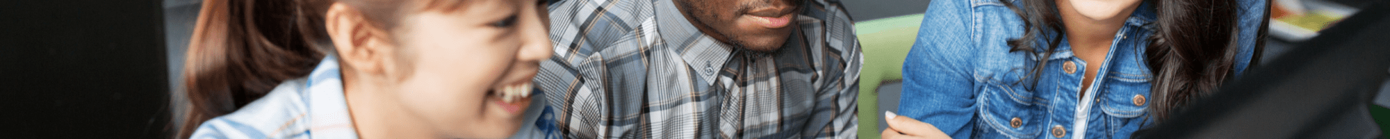 Image: a group of youths gathered at the library