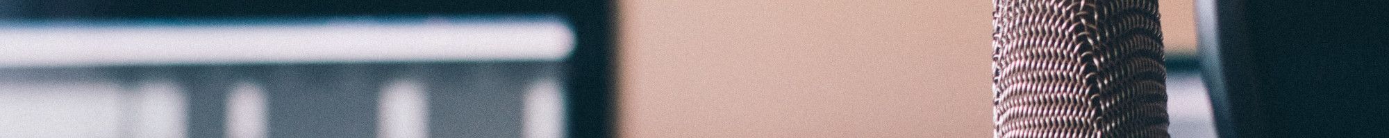 A microphone, headphones and PC