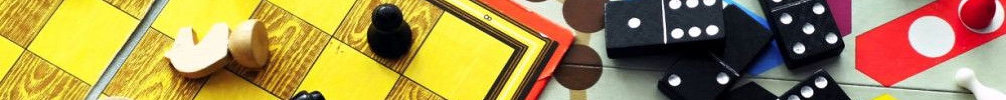 Board games and a variety of game pieces.