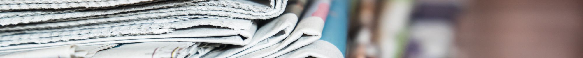 Stack of newspapers.