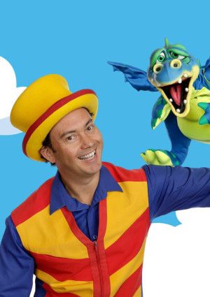 A man dressed in brightly coloured clothing against a blue sky with clouds and fruit. The words BIG Summer Read appear on the image