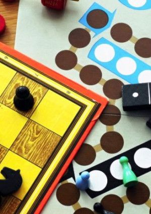 Board games and a variety of game pieces.