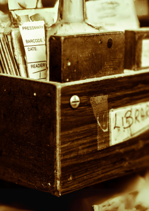 An old fashioned library card cataloguing system. The word Library appears.
