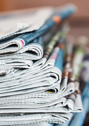 Stack of newspapers.
